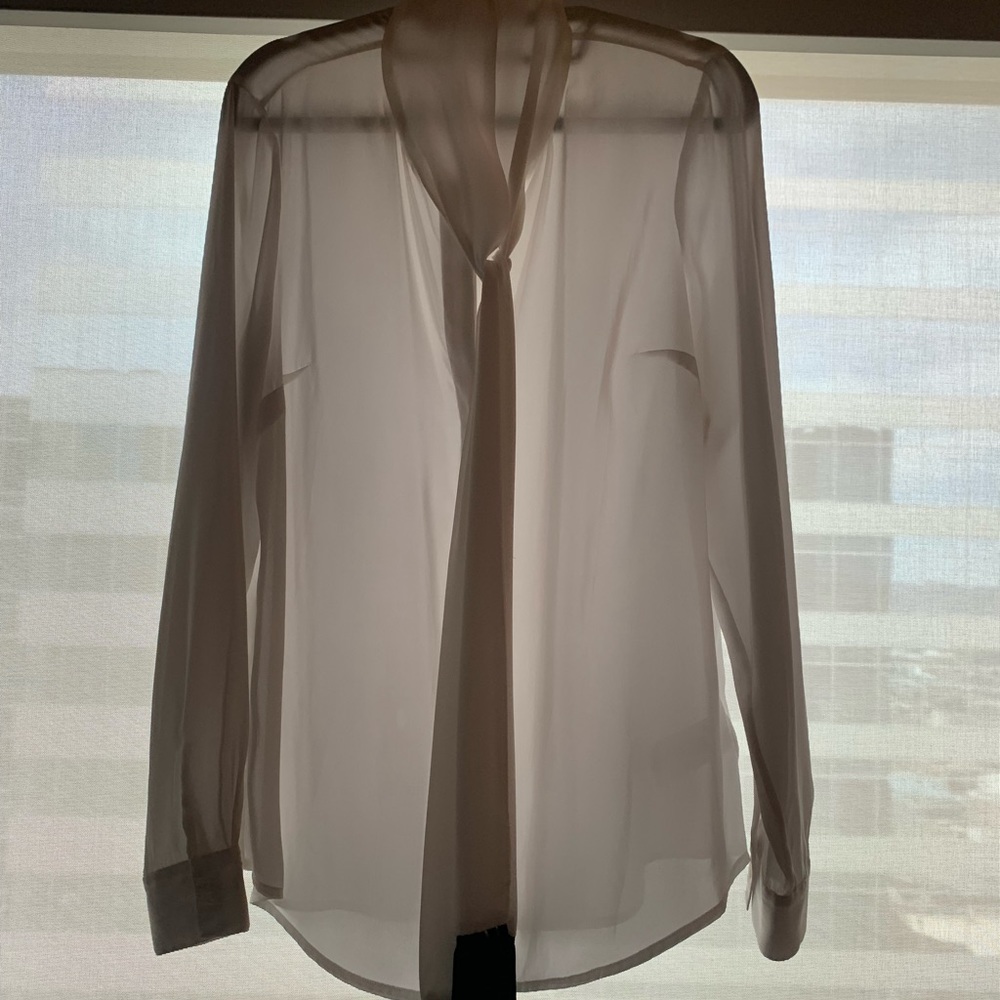 Beautiful white Michael Kors blouse with black fringe tie. Size Medium